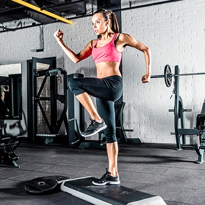 Woman Performing Exercise