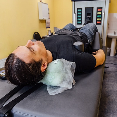 Person Wearing Jeans In Decompression Machine