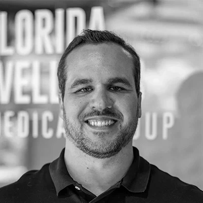 Chiropractor Ryan Klee Smiling Outdoors